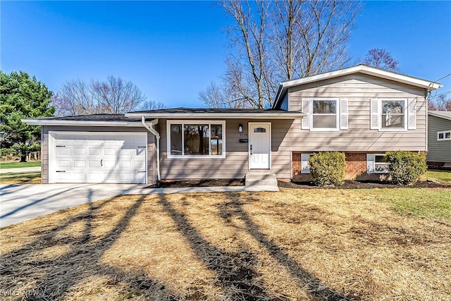 1139 Dover Center Rd, Westlake, OH 44145 - tri-level home featuring a garage and concrete driveway