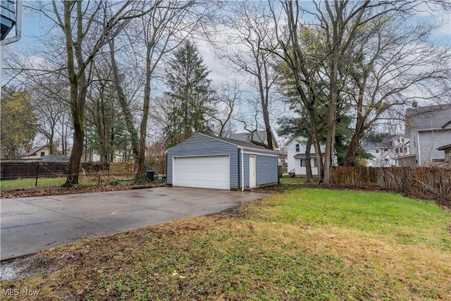 detached garage with fence