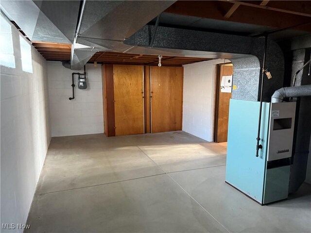 4830 Autumn Ln, Brooklyn, OH 44144 - basement with concrete block wall and heating unit