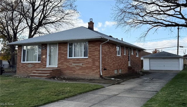 4830 Autumn Ln, Brooklyn, OH 44144 - view of front of house with an outbuilding, a detached garage, a front lawn, brick siding, and a chimney