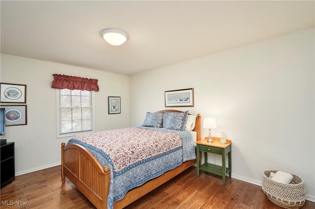 4339 Sierra Dr, Copley, OH 44321 - bedroom featuring wood-type flooring and baseboards