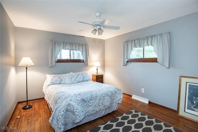 3035 Hamilton Rd, Medina, OH 44256 - bedroom featuring visible vents, baseboards, ceiling fan, and wood finished floors