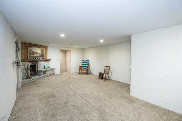 3035 Hamilton Rd, Medina, OH 44256 - carpeted living room with recessed lighting, a brick fireplace, and concrete block wall