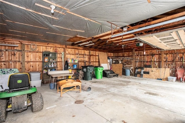 3035 Hamilton Rd, Medina, OH 44256 - garage with a garage door opener and wood walls