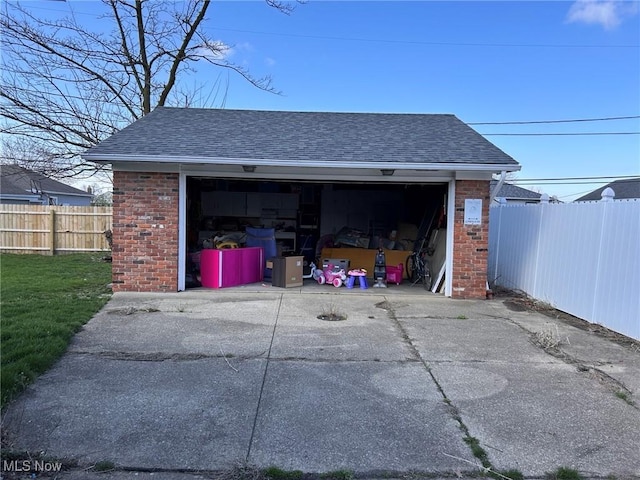 detached garage with fence