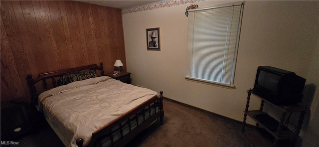 1352 Madison Ave, Lorain, OH 44053 - bedroom featuring wooden walls, baseboards, and carpet floors