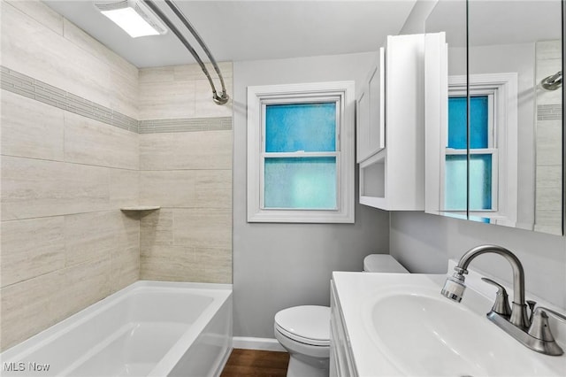 43 Hamilton Ave, Poland, OH 44514 - full bathroom with shower / bath combination, vanity, baseboards, and toilet