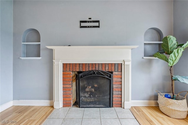 43 Hamilton Ave, Poland, OH 44514 - details with wood finished floors, baseboards, a brick fireplace, and built in features