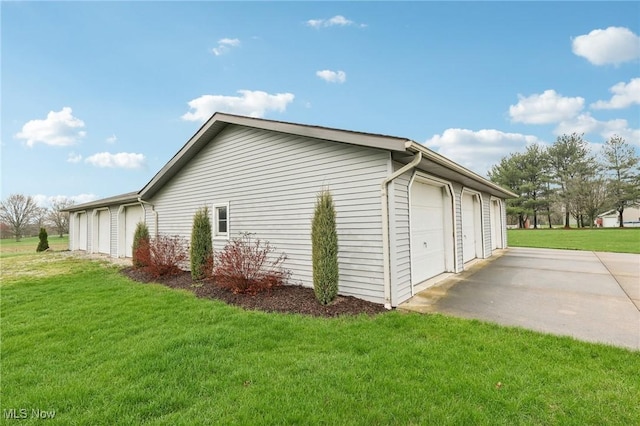 view of property exterior featuring a lawn
