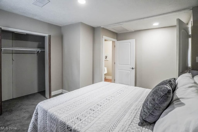 bedroom featuring dark colored carpet, a closet, recessed lighting, attic access, and visible vents