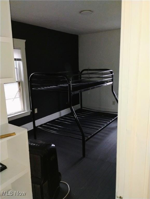 6010 Maurice Ave, Cleveland, OH 44127 - bedroom featuring wood finished floors
