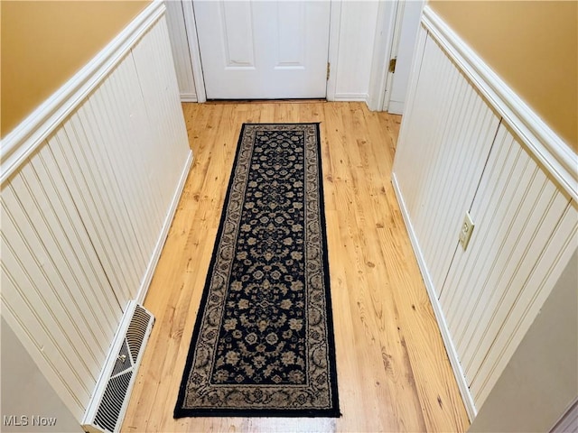 doorway featuring visible vents and light wood finished floors