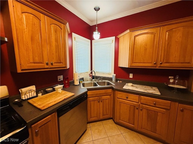 kitchen featuring brown cabinetry, dark countertops, appliances with stainless steel finishes, and a sink