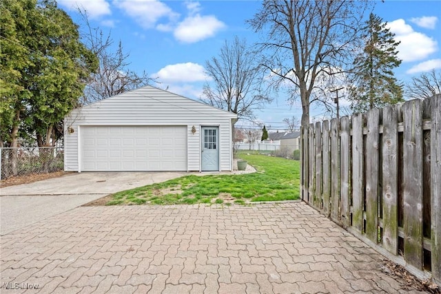 detached garage with fence