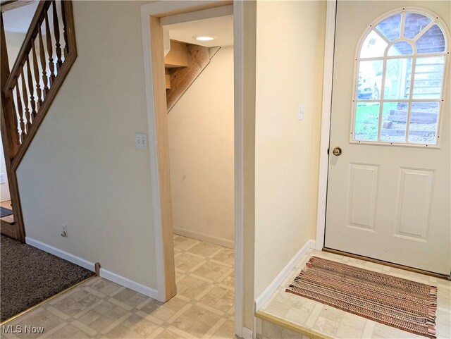 14864 Hayes Rd, Middlefield, OH 44062 - doorway to outside with light flooring, baseboards, and stairs
