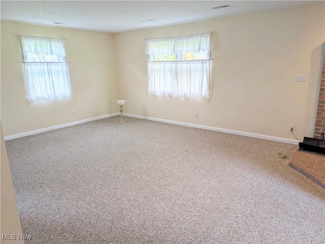 14864 Hayes Rd, Middlefield, OH 44062 - carpeted empty room with baseboards