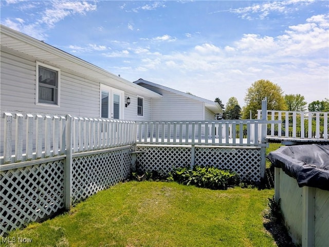 14864 Hayes Rd, Middlefield, OH 44062 - view of green lawn with a deck
