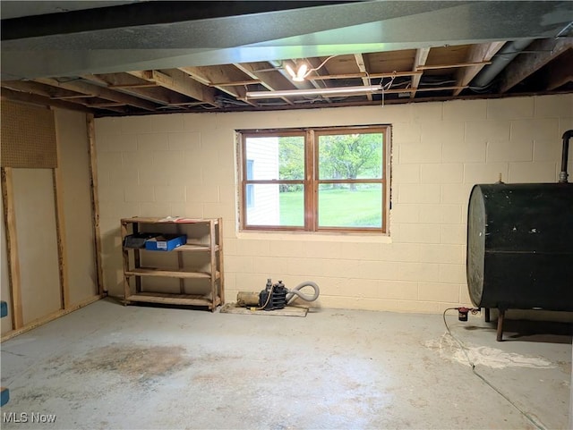 14864 Hayes Rd, Middlefield, OH 44062 - basement featuring oil tank and concrete block wall