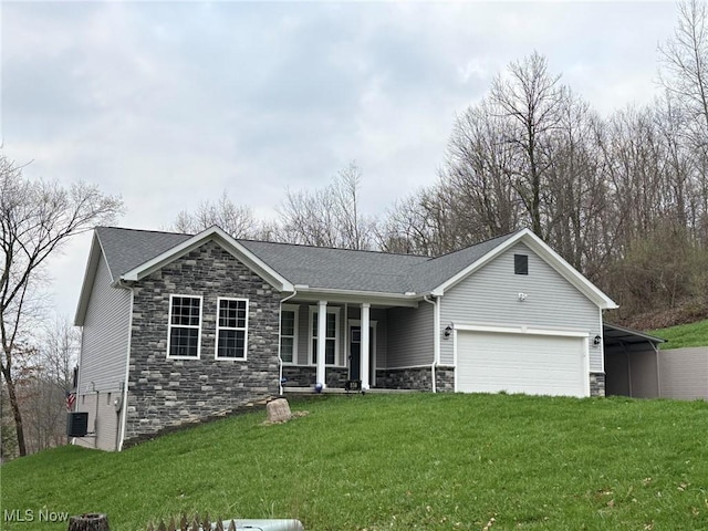 single story home featuring a front yard, stone siding, covered porch, a garage, and central air condition unit