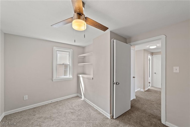 17207 Stockbridge Ave, Cleveland, OH 44128 - unfurnished bedroom featuring carpet flooring, baseboards, and a ceiling fan