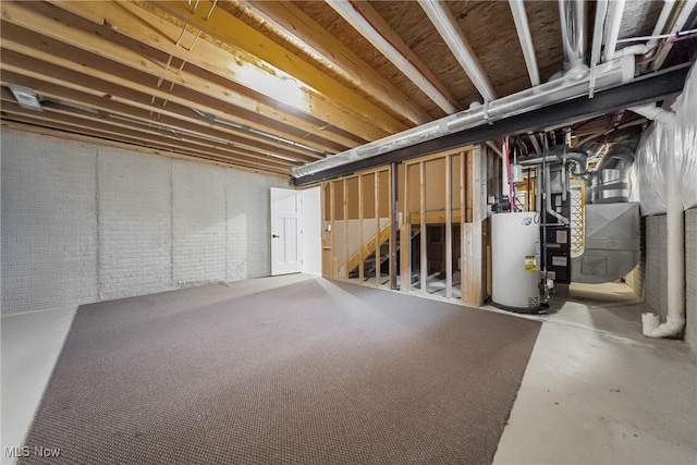 4643 Pebble Creek Ct, Peninsula, OH 44264 - unfinished basement featuring gas water heater and stairs