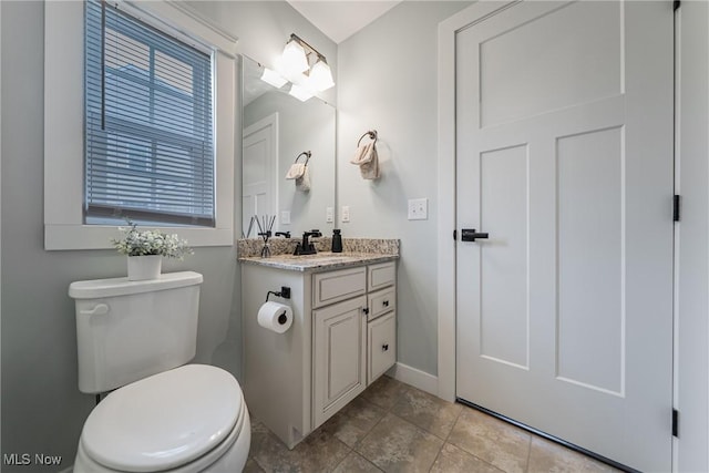 4643 Pebble Creek Ct, Peninsula, OH 44264 - bathroom with vanity, toilet, and baseboards
