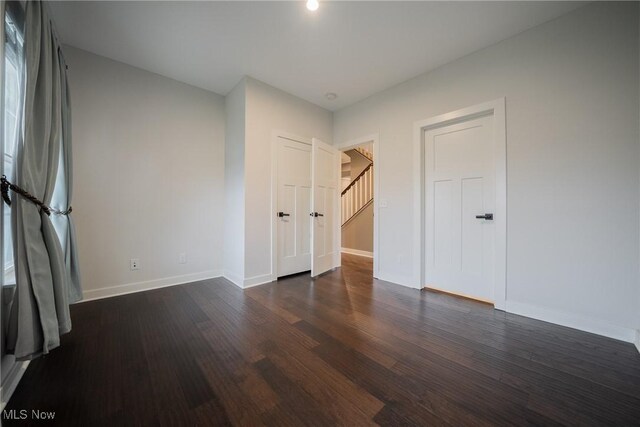 4643 Pebble Creek Ct, Peninsula, OH 44264 - unfurnished room featuring dark wood finished floors and baseboards