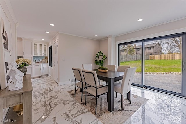20601 Shelburne Rd, Shaker Heights, OH 44122 - dining room with light marble finish floors, ornamental molding, and recessed lighting