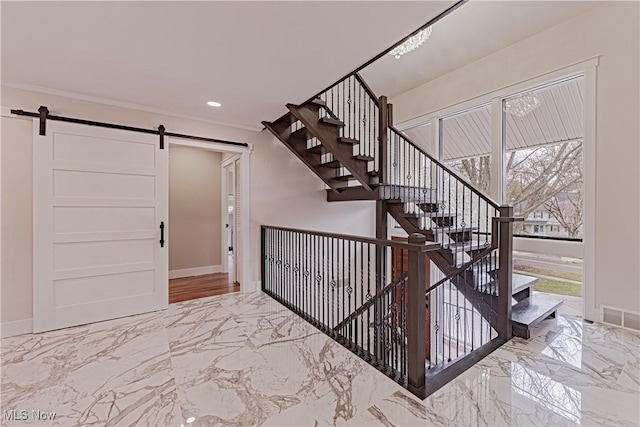 20601 Shelburne Rd, Shaker Heights, OH 44122 - staircase with a barn door, marble tiled flooring, ornamental molding, and recessed lighting