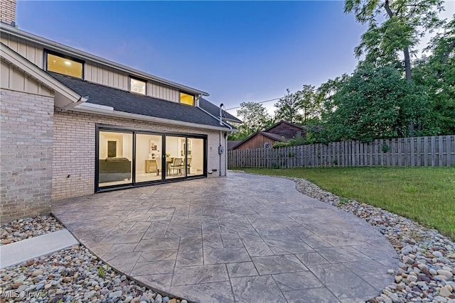 20601 Shelburne Rd, Shaker Heights, OH 44122 - patio terrace at dusk featuring a patio