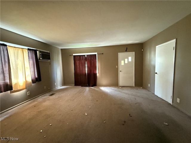 3893 E 55th St, Cleveland, OH 44105 - foyer with plenty of natural light and a wall mounted air conditioner