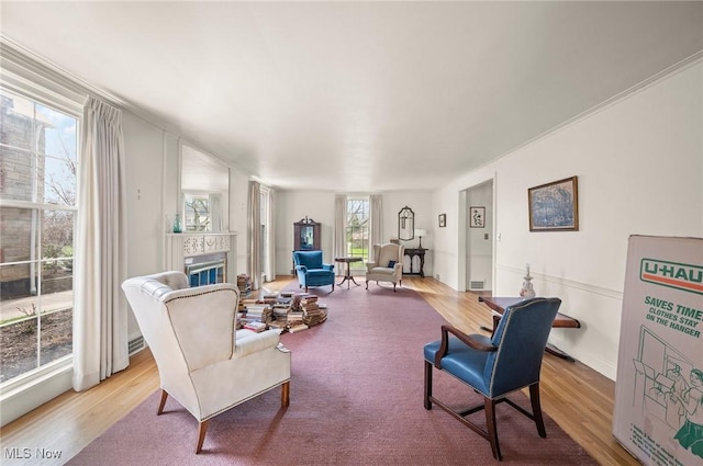 2691 Rocklyn Rd, Shaker Heights, OH 44122 - living room featuring a glass covered fireplace and wood finished floors