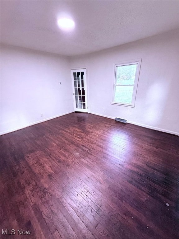 270 Coitsville Rd, Campbell, OH 44405 - empty room featuring dark wood-style floors and baseboards