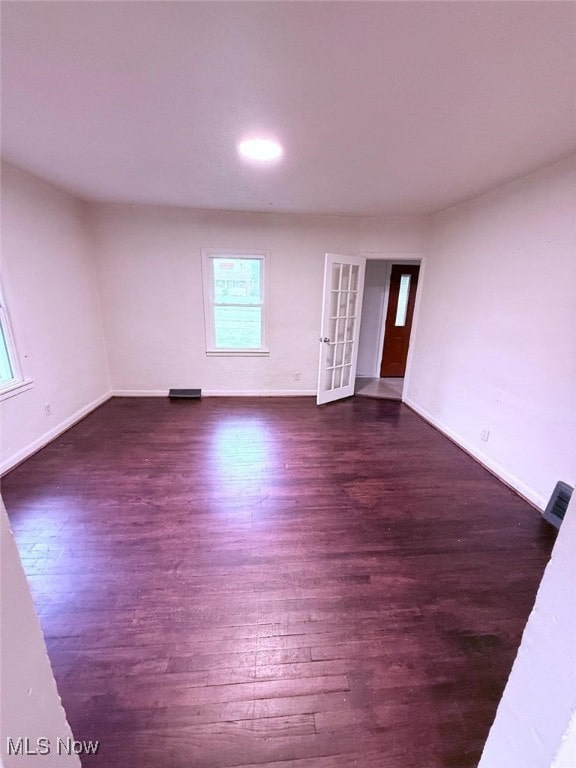 270 Coitsville Rd, Campbell, OH 44405 - empty room featuring plenty of natural light, wood finished floors, and french doors
