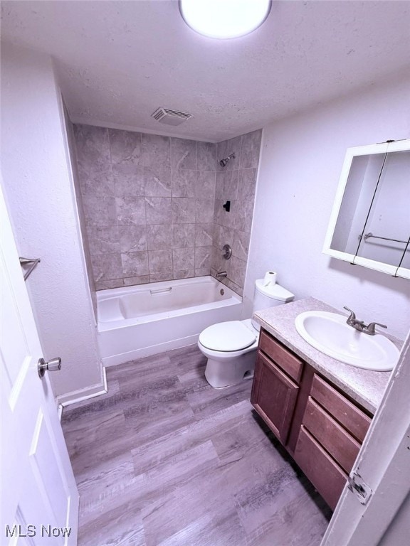 270 Coitsville Rd, Campbell, OH 44405 - bathroom featuring vanity, shower / tub combination, and wood finished floors