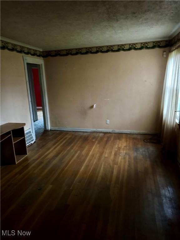 471 W Hylda, Youngstown, OH 44511 - empty room featuring dark wood-type flooring and baseboards