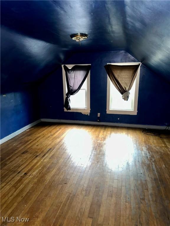 471 W Hylda, Youngstown, OH 44511 - additional living space with baseboards, hardwood / wood-style floors, and lofted ceiling