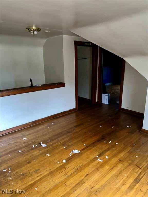 471 W Hylda, Youngstown, OH 44511 - additional living space with baseboards, hardwood / wood-style flooring, and vaulted ceiling