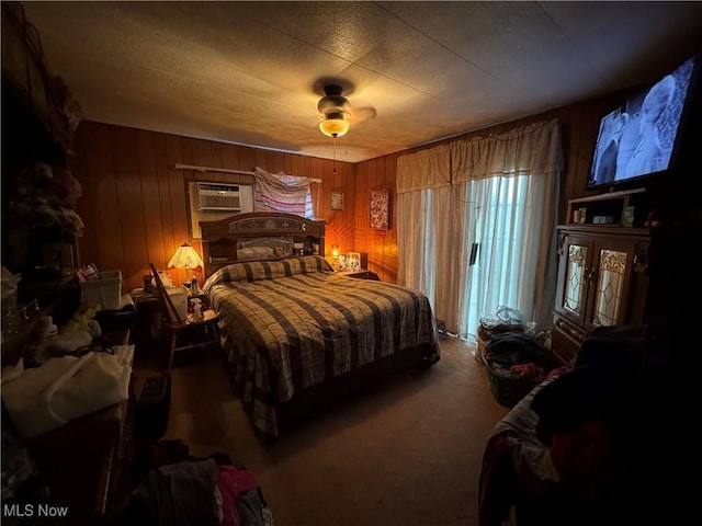 1110 3rd St, Belpre, OH 45714 - carpeted bedroom with wood walls and a wall unit AC