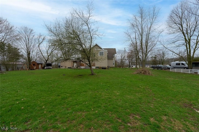 view of yard featuring fence