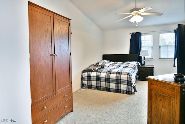 345 S Linden Ct, Warren, OH 44484 - bedroom featuring light carpet, vaulted ceiling, and ceiling fan