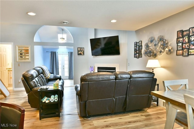 345 S Linden Ct, Warren, OH 44484 - living room featuring recessed lighting, a fireplace, light wood finished floors, and a ceiling fan