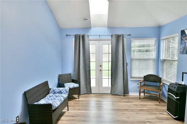 345 S Linden Ct, Warren, OH 44484 - living area featuring french doors, baseboards, wood finished floors, and lofted ceiling