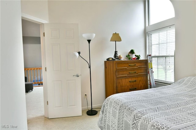345 S Linden Ct, Warren, OH 44484 - bedroom with carpet floors, baseboards, and multiple windows