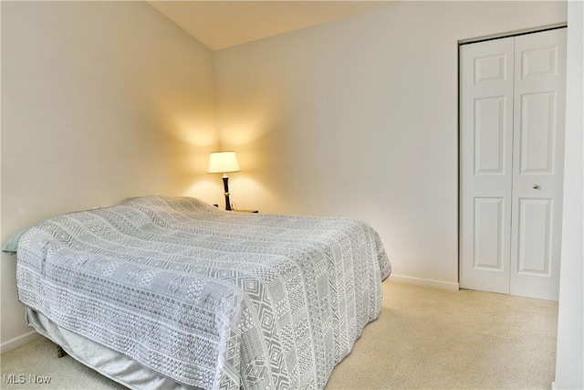 345 S Linden Ct, Warren, OH 44484 - carpeted bedroom with baseboards and a closet