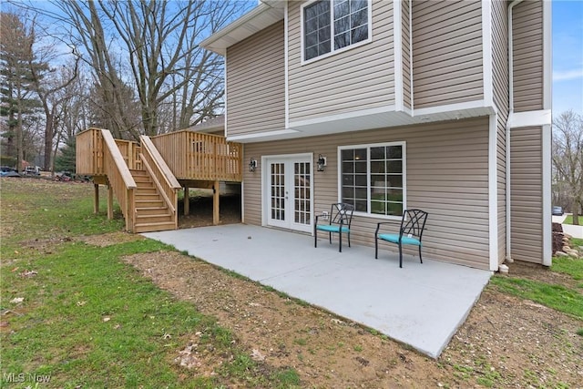 exterior space featuring french doors, a deck, and stairway