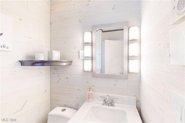bathroom with a sink and toilet