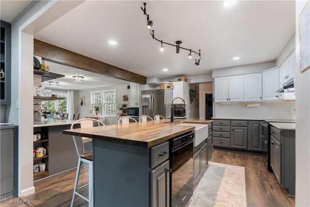 2119 Devonshire Dr NW, Canton, OH 44708 - kitchen featuring a kitchen breakfast bar, black appliances, open shelves, and gray cabinets
