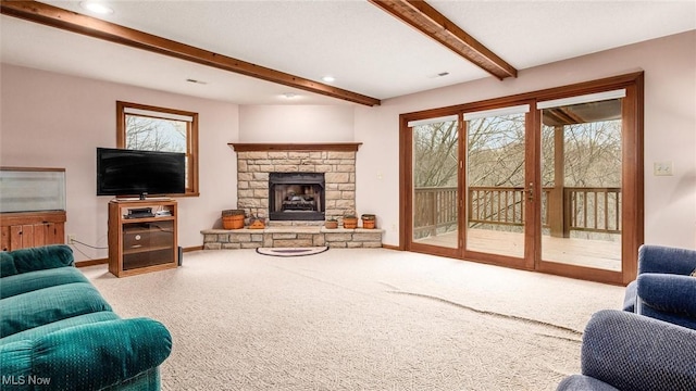 carpeted living area featuring visible vents, baseboards, a stone fireplace, beamed ceiling, and recessed lighting