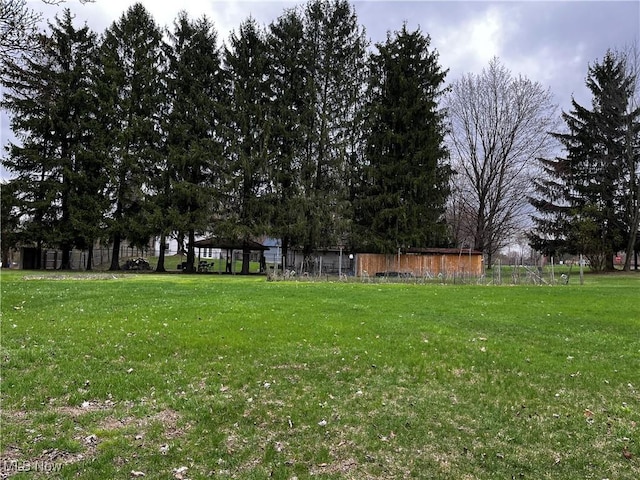view of yard featuring fence